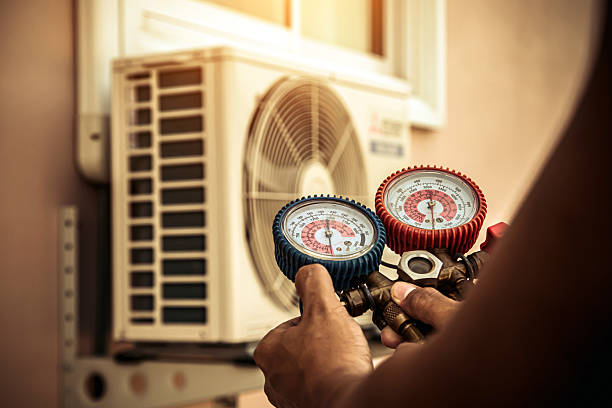 Professional Air Conditioning Service technician working in Franklin Lakes, NJ